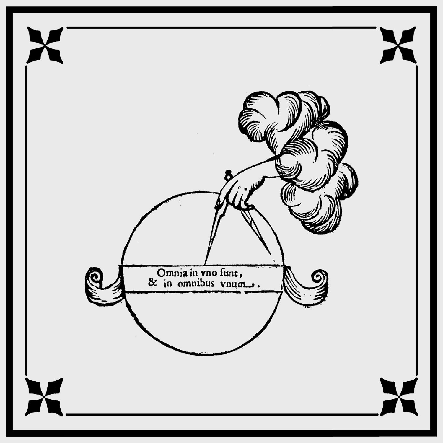 hand holding compass to latin text in a circle